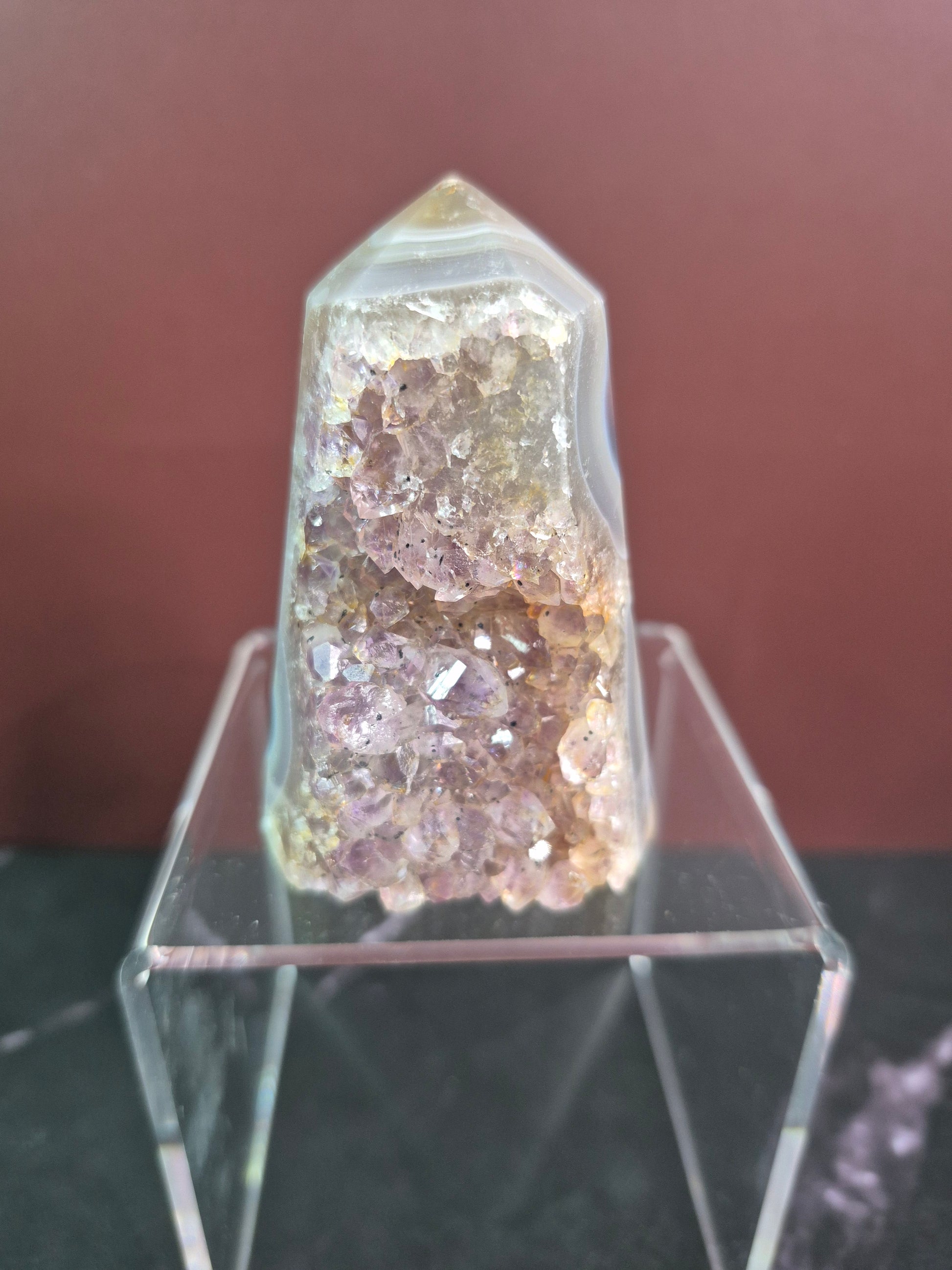 Crystal on a stand with a blurred background